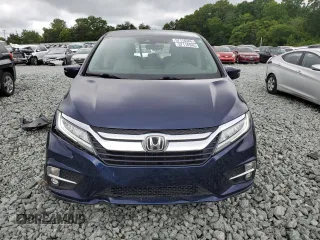 2018 Honda Odyssey Elite z VIN 5FNRL6H9XJB039802, wystawiony jako Copart lot #57116345 z przebiegiem 107 939 mil mil oraz Szkody całkowita. Historia ofert i sprzedaży dostępna na DreamBid. Obrazek 5.