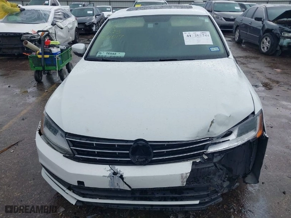 2018 Volkswagen Jetta 1.4T SE with VIN 3VWDB7AJ1JM221517, listed as a IAAI auction lot 41329474 with 87,450 mi miles. Bid and sale history available at carsss.com. Image 12.