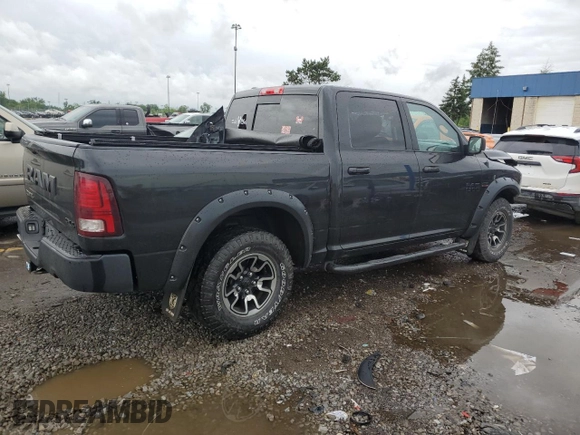 2015 Ram 1500 Rebel with VIN 1C6RR7YT8FS743062, listed as a Copart auction lot 61678185 with 130,997 mi miles and Clean title. Bid and sale history available at DreamBid. Image 3.