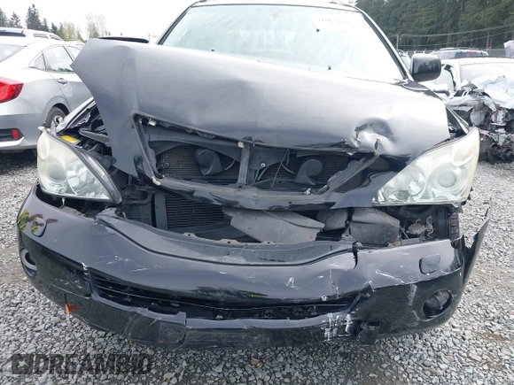 2006 Lexus RX 400h z VIN JTJHW31U260041868, wystawiony jako IAAI lot #41985843 z przebiegiem 176 313 mil mil oraz . Historia ofert i sprzedaży dostępna na DreamBid. Obrazek 6.