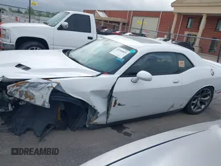 2015 Dodge Challenger SXT Plus with VIN 2C3CDZBG8FH906356, listed as a IAAI auction lot 42396865 with 184,565 mi miles and . Bid and sale history available at DreamBid. Image 14.