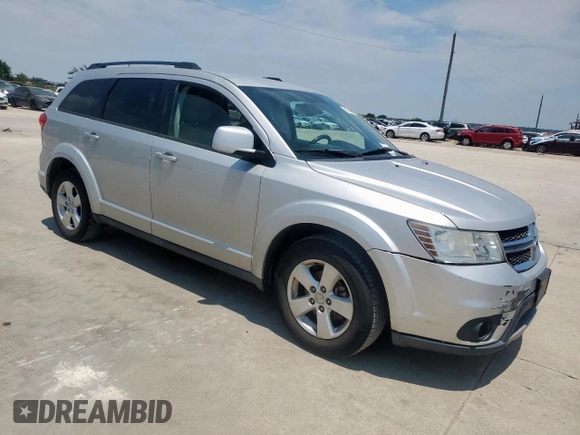 2012 Dodge Journey SXT with VIN 3C4PDCBG1CT134375, listed as a Copart auction lot 61059305 with 165,913 mi miles and Salvage title. Bid and sale history available at DreamBid. Image 4.