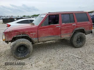 1992 Jeep Cherokee with VIN 1J4FJ58S4NL200373, listed as a Copart auction lot 57340475 with 194,713 mi miles and Salvage title. Bid and sale history available at DreamBid. Image 1.