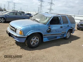 1997 Chevrolet Blazer LS z VIN 1GNDT13W6V2137154, wystawiony jako Copart lot #56912355 z przebiegiem 213 487 mil mil oraz Szkoda całkowita • Salvage title. Historia ofert i sprzedaży dostępna na DreamBid. Obrazek 1.