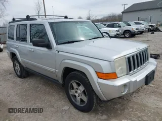 2010 Jeep Commander Sport with VIN 1J4RG4GK1AC158407, listed as a IAAI auction lot 41883678 with 206,949 mi miles. Bid and sale history available at carsss.com. Image 1.