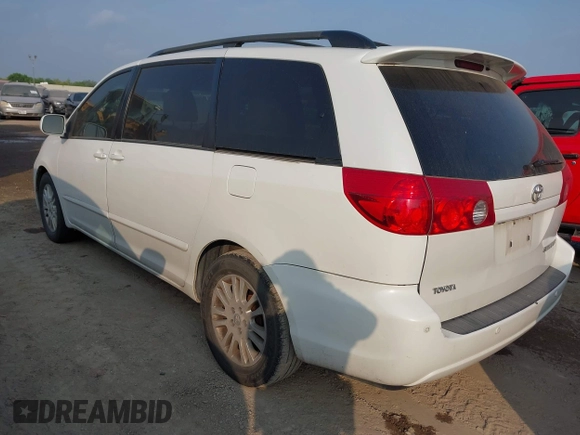 2009 Toyota Sienna XLE with VIN 5TDZK22C19S227678, listed as a IAAI auction lot 42074502 with 173,718 mi miles. Bid and sale history available at carsss.com. Image 3.