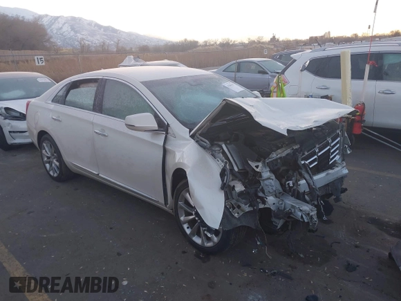 2014 Cadillac XTS Premium with VIN 2G61P5S30E9123057, listed as a IAAI auction lot 41301457 with 123,042 mi miles and . Bid and sale history available at DreamBid. Image 1.