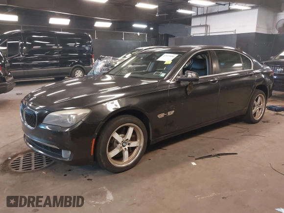 2011 BMW 7 Series 750Li xDrive with VIN WBAKC8C56BC433083, listed as a IAAI auction lot 42523890 with 120,977 mi miles and . Bid and sale history available at DreamBid. Image 18.