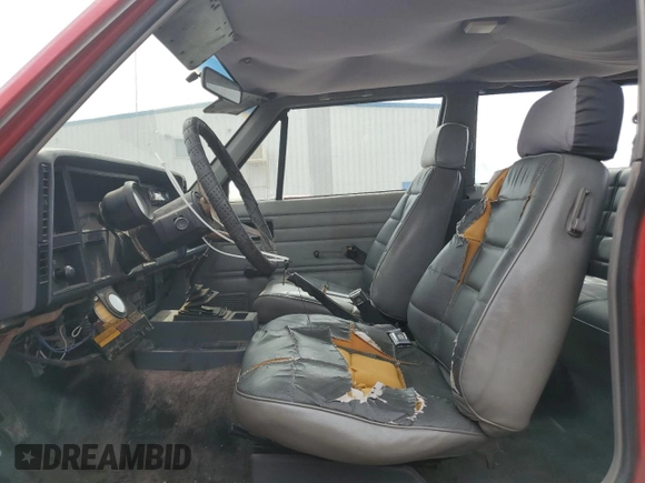 1993 Jeep Cherokee SE with VIN 1J4FT27P2PL619945, listed as a Copart auction lot 59053465 with 222,336 mi miles and Clean title. Bid and sale history available at DreamBid. Image 7.