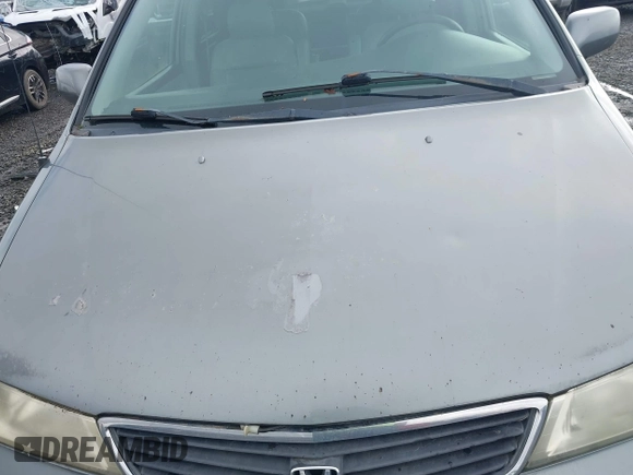 2000 Honda Odyssey EX z VIN 2HKRL1869YH009047, wystawiony jako IAAI lot #41603779 z przebiegiem 281 110 mil mil oraz . Historia ofert i sprzedaży dostępna na DreamBid. Obrazek 6.