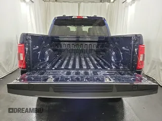 2023 Ford F-150 XL with VIN 1FTFW1E81PFB69495, listed as a IAAI auction lot 42141853 with 19,823 mi miles. Bid and sale history available at carsss.com. Image 1.