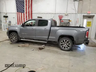 2021 GMC Canyon 4WD Denali with VIN 1GTG6EEN3M1129459, listed as a Copart auction lot 87618305 with 37,663 mi miles and Salvage Title. Bid and sale history available at carsss.com. Image 2.