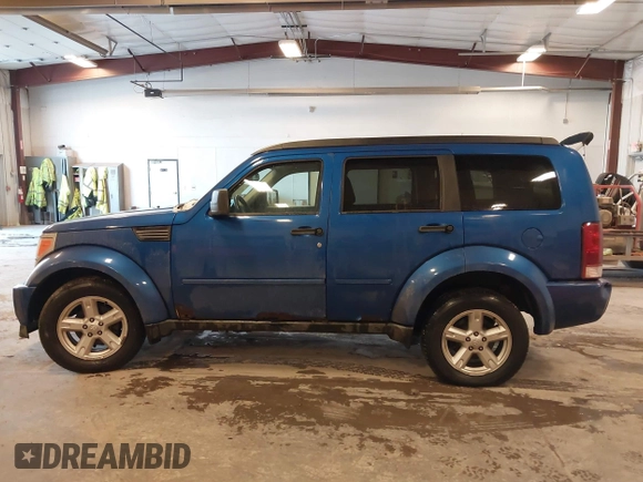 2007 Dodge Nitro SLT with VIN 1D8GU58KX7W614584, listed as a IAAI auction lot 41036412 with 177,523 mi miles. Bid and sale history available at carsss.com. Image 14.