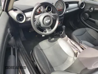 2013 MINI Hardtop with VIN WMWSU3C57DT689655, listed as a Copart auction lot 52161215 with 40,250 mi miles and Salvage Title. Bid and sale history available at DreamBid. Image 8.