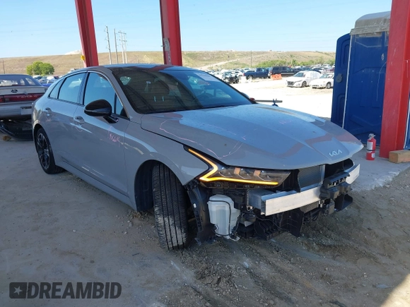 2023 Kia K5 GT-Line z VIN 5XXG64J24PG183772, wystawiony jako IAAI lot #42155447 z przebiegiem 25 313 mil mil oraz . Historia ofert i sprzedaży dostępna na DreamBid. Obrazek 1.