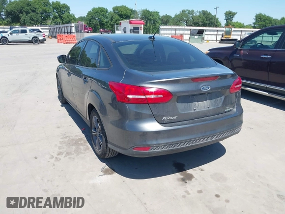 2018 Ford Focus SE with VIN 1FADP3FE3JL204220, listed as a IAAI auction lot 41972960 with 62,682 mi miles and . Bid and sale history available at DreamBid. Image 3.
