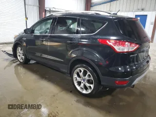 2013 Ford Escape Titanium with VIN 1FMCU9J93DUC84611, listed as a Copart auction lot 59046515 with 126,386 mi miles and Salvage title. Bid and sale history available at DreamBid. Image 2.