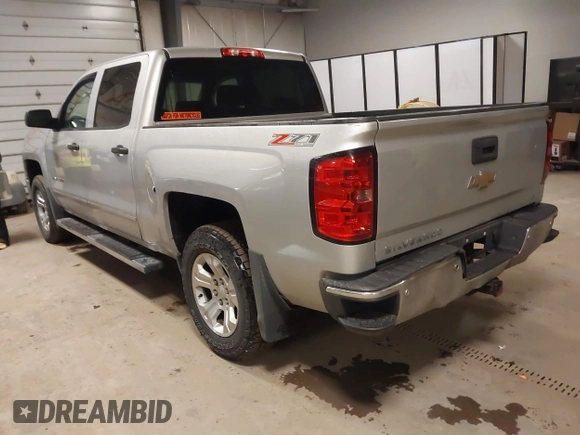 2014 Chevrolet Silverado 1500 LT with VIN 3GCUKREC4EG291351, listed as a IAAI auction lot 41732290 with 194,135 mi miles and . Bid and sale history available at DreamBid. Image 3.
