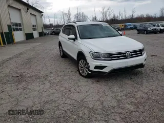 2018 Volkswagen Tiguan SEL with VIN 3VV2B7AX9JM065985, listed as a Copart auction lot 79404694 with Not provided miles and Salvage title. Bid and sale history available at DreamBid. Image 14.