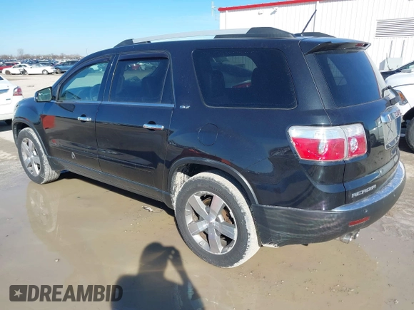 2012 GMC Acadia SLT2 with VIN 1GKKRSED8CJ227011, listed as a IAAI auction lot 41606522 with 131,479 mi miles. Bid and sale history available at carsss.com. Image 3.