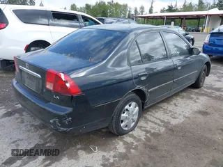 2002 Honda Civic LX with VIN 1HGES16552L060982, listed as a IAAI auction lot 42141884 with 202,659 mi miles and . Bid and sale history available at DreamBid. Image 4.