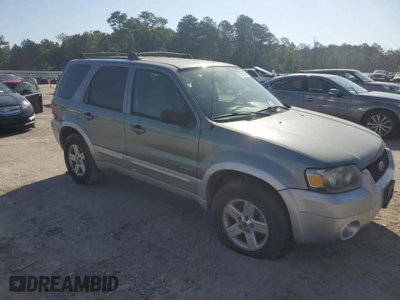 2005 Ford Escape Hybrid z VIN 1FMCU95HX5KB95634, wystawiony jako Copart lot #56513595 z przebiegiem 228 188 mil mil oraz Czysty tytuł • Clean title. Historia ofert i sprzedaży dostępna na DreamBid. Obrazek 4.