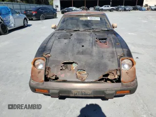 1982 Datsun 280ZX 2+2 z VIN JN1HZ06S8CX428785, wystawiony jako Copart lot #80942274 z przebiegiem 88 574 mil mil oraz Tytuł czysty. Historia ofert i sprzedaży dostępna na DreamBid. Obrazek 5.