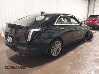 2021 Cadillac CT4 Premium Luxury z VIN 1G6DF5RK6M0133758, wystawiony jako IAAI lot #40832245 z przebiegiem 13 543 mil mil oraz . Historia ofert i sprzedaży dostępna na DreamBid. Obrazek 4.