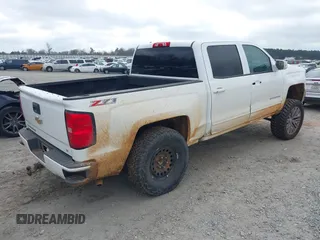 2017 Chevrolet Silverado 1500 LT with VIN 3GCUKREC7HG100199, listed as a IAAI auction lot 41542046 with 224,692 mi miles and . Bid and sale history available at DreamBid. Image 4.