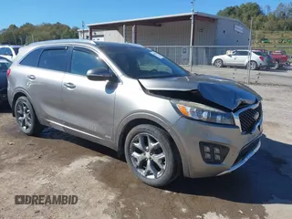 2016 Kia Sorento SXL z VIN 5XYPKDA15GG031904, wystawiony jako IAAI lot #40570106 z przebiegiem 114 549 mil mil oraz . Historia ofert i sprzedaży dostępna na DreamBid. Obrazek 1.