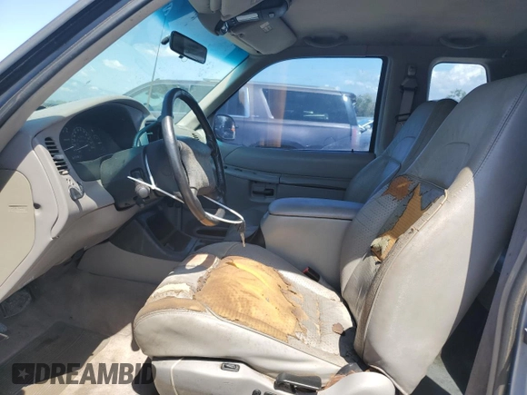 1998 Ford Explorer Sport with VIN 1FMYU22X6WUA20814, listed as a Copart auction lot 68060284 with 180,785 mi miles and Clean title. Bid and sale history available at DreamBid. Image 7.