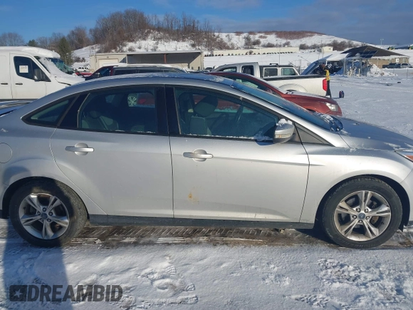 2012 Ford Focus SE with VIN 1FAHP3F27CL457213, listed as a IAAI auction lot 41303904 with 215,044 mi miles and . Bid and sale history available at DreamBid. Image 13.