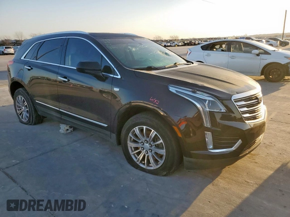 2017 Cadillac XT5 Luxury FWD with VIN 1GYKNBRS9HZ100304, listed as a Copart auction lot 48698755 with 93,407 mi miles and Salvage Title. Bid and sale history available at carsss.com. Image 4.