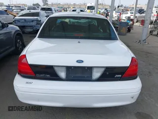 2009 Ford Police Interceptor with VIN 2FAHP71V29X129265, listed as a IAAI auction lot 42381382 with Not provided miles and . Bid and sale history available at DreamBid. Image 16.