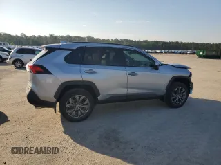 2024 Toyota RAV4 Hybrid XLE Premium z VIN 2T3B6RFV0RW074218, wystawiony jako Copart lot #56917295 z przebiegiem 14 969 mil mil oraz Szkoda całkowita • Salvage title. Historia ofert i sprzedaży dostępna na DreamBid. Obrazek 3.