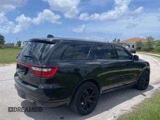 2016 Dodge Durango R/T with VIN 1C4SDHCT2GC476969, listed as a Copart auction lot 61194115 with 86,000 mi miles and Clean title. Bid and sale history available at DreamBid. Image 4.