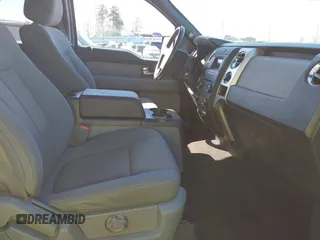 2014 Ford F-150 XL with VIN 1FTFW1CF2EKD08667, listed as a IAAI auction lot 41705412 with 129,817 mi miles. Bid and sale history available at carsss.com. Image 5.