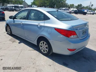 2014 Hyundai Accent GLS with VIN KMHCT4AE2EU608104, listed as a IAAI auction lot 41943590 with 125,808 mi miles. Bid and sale history available at carsss.com. Image 3.