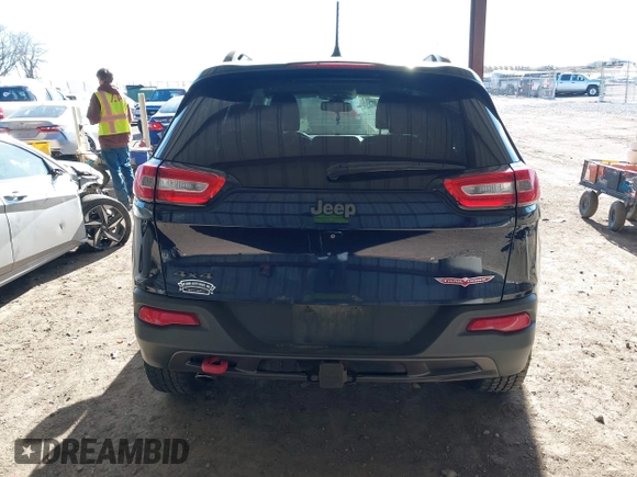 2015 Jeep Cherokee Trailhawk with VIN 1C4PJMBB1FW520649, listed as a IAAI auction lot 41991904 with 168,533 mi miles and . Bid and sale history available at DreamBid. Image 17.