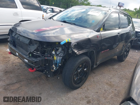 2023 Jeep Compass Trailhawk with VIN 3C4NJDDNXPT536872, listed as a IAAI auction lot 42437282 with 28,293 mi miles and . Bid and sale history available at DreamBid. Image 2.