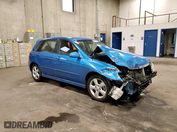 2007 Kia Spectra with VIN KNAFE161775007569, listed as a Copart auction lot 86778784 with 125,463 mi miles and Salvage Title. Bid and sale history available at carsss.com. Image 10.