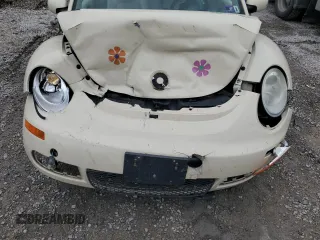 2009 Volkswagen Beetle S with VIN 3VWRF31Y99M409195, listed as a Copart auction lot 55010054 with 99,635 mi miles and Salvage title. Bid and sale history available at DreamBid. Image 11.