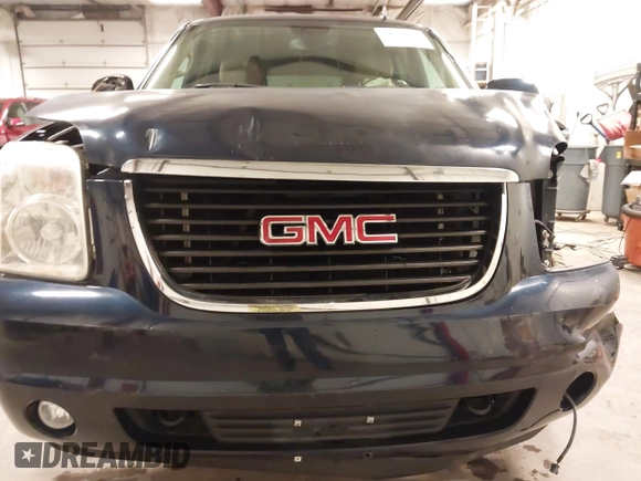 2007 GMC Yukon SLT z VIN 1GKFK130X7J115798, wystawiony jako IAAI lot #42039550 z przebiegiem 263 539 mil mil oraz . Historia ofert i sprzedaży dostępna na DreamBid. Obrazek 19.
