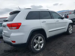 2013 Jeep Grand Cherokee Overland with VIN 1C4RJFCT4DC640553, listed as a IAAI auction lot 41311413 with 146,212 mi miles. Bid and sale history available at carsss.com. Image 4.