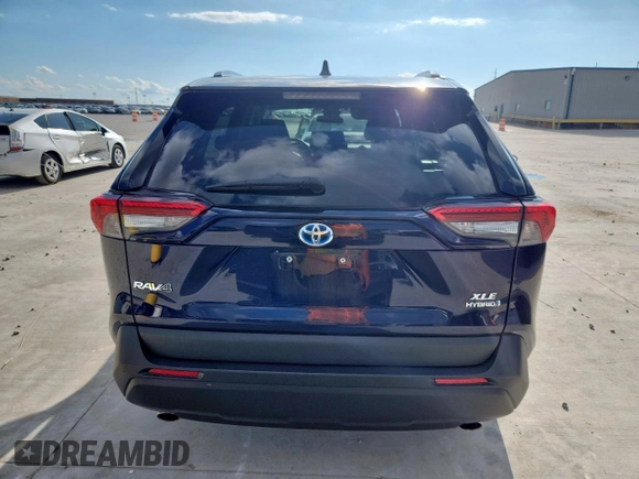 2022 Toyota RAV4 Hybrid XLE with VIN 2T3RWRFV0NW138427, listed as a Copart auction lot 60860815 with 27,772 mi miles and Salvage title. Bid and sale history available at DreamBid. Image 6.