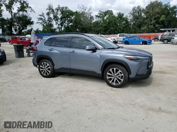 2022 Toyota Corolla Cross XLE z VIN 7MUDAAAG9NV036831, wystawiony jako Copart lot #60986125 z przebiegiem 6 642 mil mil oraz Szkoda całkowita • Salvage title. Historia ofert i sprzedaży dostępna na DreamBid. Obrazek 14.