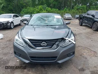 2018 Nissan Altima SR with VIN 1N4AL3AP6JC267111, listed as a IAAI auction lot 42070413 with 117,954 mi miles and . Bid and sale history available at carsss.com. Image 12.