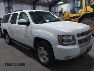 2013 Chevrolet Suburban LT with VIN 1GNSKJE7XDR266276, listed as a IAAI auction lot 41536836 with 229,204 mi miles and . Bid and sale history available at DreamBid. Image 1.