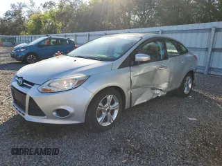 2014 Ford Focus SE with VIN 1FADP3F26EL324203, listed as a Copart auction lot 48940535 with 90,056 mi miles and Salvage Title. Bid and sale history available at carsss.com. Image 1.