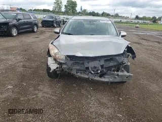 2011 Mazda 3 i Touring with VIN JM1BL1VF3B1491700, listed as a Copart auction lot 61573885 with 145,626 mi miles and Salvage title. Bid and sale history available at DreamBid. Image 5.
